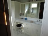 Custom Bath Cabinets designed, built, and installed by Kremers Cabinets Inc.
